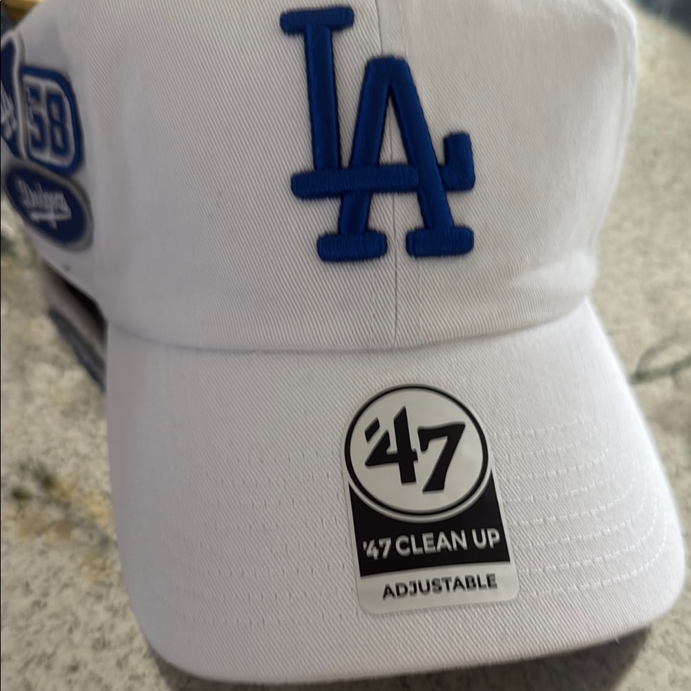 Urban Outfitters White Cap with Blue Logo